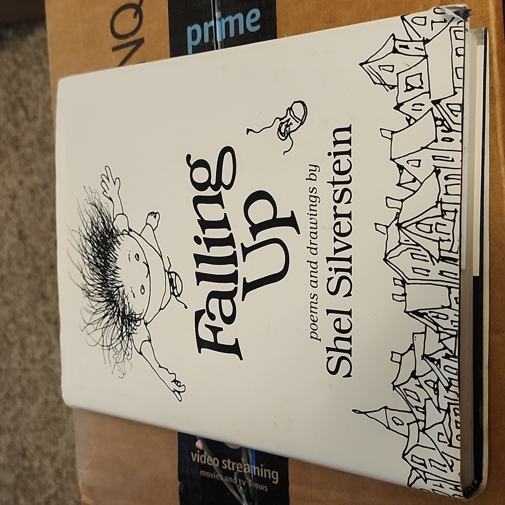Falling up hard back book